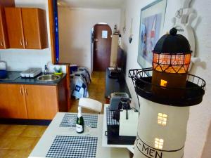 Kuchyňa alebo kuchynka v ubytovaní Appartement Vue Mer - Albatros