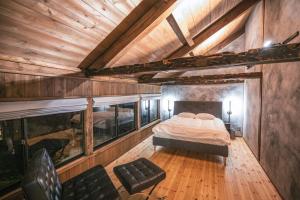 Postel nebo postele na pokoji v ubytování MITSU-House