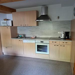 Kuchyň nebo kuchyňský kout v ubytování Haus Bacher