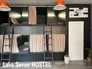 a room with bunk beds in a hostel at Lake Sevan Hostel in Sevan