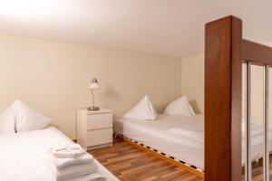 Letto o letti in una camera di Hotel Sursee
