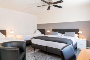 Letto o letti in una camera di Hotel Sursee