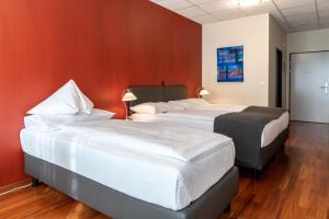 Letto o letti in una camera di Hotel Sursee
