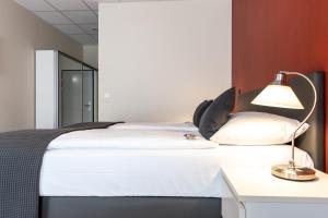 Letto o letti in una camera di Hotel Sursee