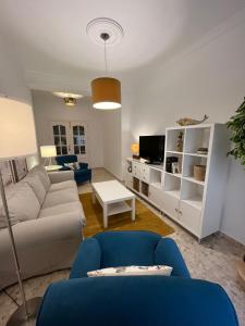 Televízia a/alebo spoločenská miestnosť v ubytovaní Apartamento Camberos Antequera