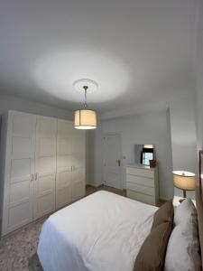 Posteľ alebo postele v izbe v ubytovaní Apartamento Camberos Antequera