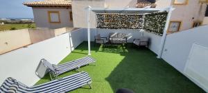 Fotografia z galérie ubytovania Lomas de Cabo Roig Top floor apartment with Sea View Airport Collection included T&C v destinácii Orihuela