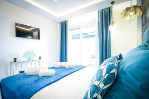 Posteľ alebo postele v izbe v ubytovaní MARBELLA BANUS SUITES - Marbella Marina Banus Deluxe Apartment Sea Views