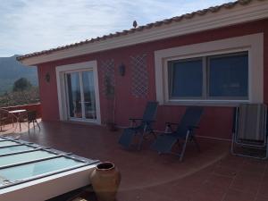 A balcony or terrace at L'Albaida, tranquility, views of sea and mountains