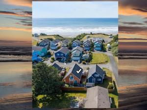 a group of houses on the beach next to the ocean at Sunkissed, Est 2015 - 90 Sec Drive to Beach, Firepit, Privacy Fenced Yard, Gardens in Pacific Beach