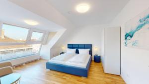 Postel nebo postele na pokoji v ubytování ALON HOMES Vienna - Premium City Center Apartments