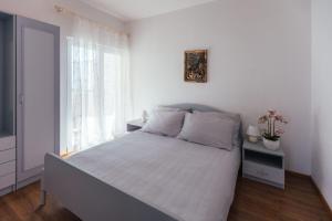 Postel nebo postele na pokoji v ubytování Villa Porta