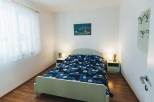 Postel nebo postele na pokoji v ubytování Villa Porta