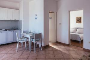 Kuchyň nebo kuchyňský kout v ubytování Villa Porta