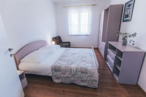 Postel nebo postele na pokoji v ubytování Villa Porta