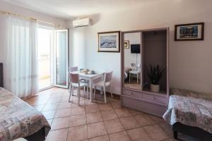 Postel nebo postele na pokoji v ubytování Villa Porta