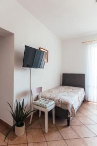 TV a/nebo společenská místnost v ubytování Villa Porta