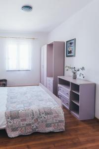 Postel nebo postele na pokoji v ubytování Villa Porta
