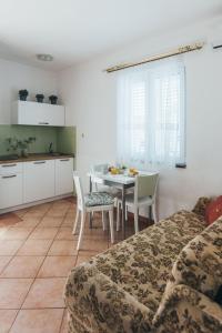 Kuchyň nebo kuchyňský kout v ubytování Villa Porta