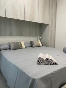 Postel nebo postele na pokoji v ubytování Appartamento La Tramontana