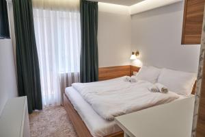 Letto o letti in una camera di Spa & wellness Villa Garetov Konak