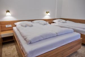 Letto o letti in una camera di Spa & wellness Villa Garetov Konak