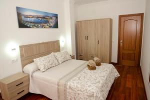 Łóżko lub łóżka w pokoju w obiekcie Casa del Patio Andaluz