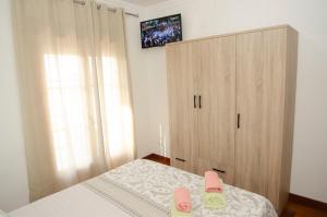Łóżko lub łóżka w pokoju w obiekcie Casa del Patio Andaluz