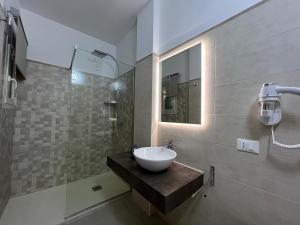 Koupelna v ubytování Perla D'Oriente - Affittacamere + 37 fotografií