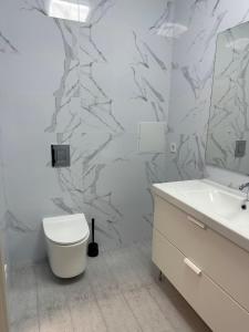 Kúpeľňa v ubytovaní Sky apartments Budova
