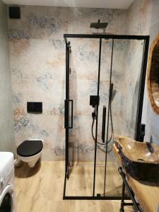 Koupelna v ubytování Domek Łeba Nowęcin + 27 fotografií