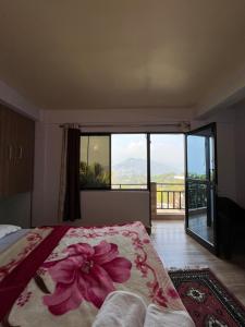 Postel nebo postele na pokoji v ubytování Hannah Homestay