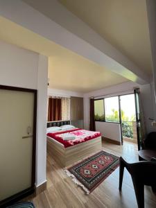 Postel nebo postele na pokoji v ubytování Hannah Homestay