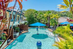 The swimming pool at or close to Magnificent 2 bed unit in heart of Port Douglas