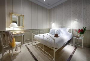 Ένα ή περισσότερα κρεβάτια σε δωμάτιο στο Casa Palacete 1822