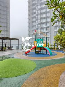 a playground in front of a large building at MagTree Genting Highlands in Genting Highlands