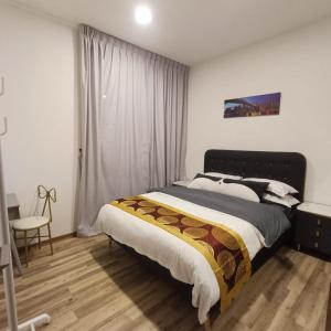 Postel nebo postele na pokoji v ubytování Mega Inn + 26 fotografií