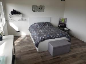 Katil atau katil-katil dalam bilik di Jolie grand studio avec vue sur les vosges, balcon