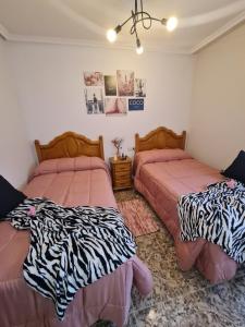Postel nebo postele na pokoji v ubytování Valle Paraiso