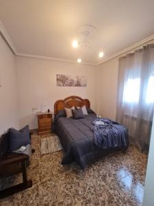 Postel nebo postele na pokoji v ubytování Valle Paraiso