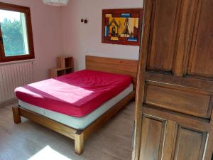Posteľ alebo postele v izbe v ubytovaní Maison des Pins