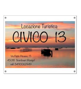 a sign that reads cure with a picture of a sunset at Civico 13 in Scardovari
