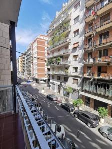 a view of a city street with parked cars and buildings at Aura Home rent of rooms with shared kitchen in Bari