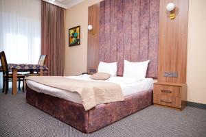 Katil atau katil-katil dalam bilik di Sunrise Hotel Baku