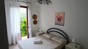 Posteľ alebo postele v izbe v ubytovaní Casa VISTA MARE