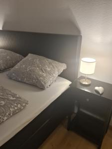 Ein Bett oder Betten in einem Zimmer der Unterkunft Ferienhaus Birute