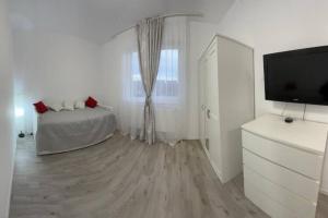 Photo de la galerie de l'établissement Urban Escape With Free Parking&Wi-Fi, à Chiajna 7 autres photos