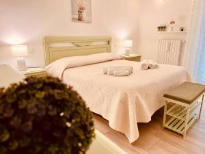 A bed or beds in a room at Casa Clarò Még 11 kép