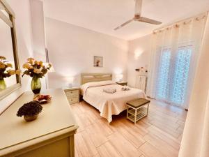 A bed or beds in a room at Casa Clarò