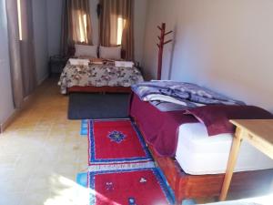 Riad Ouinz客房内的一张或多张床位